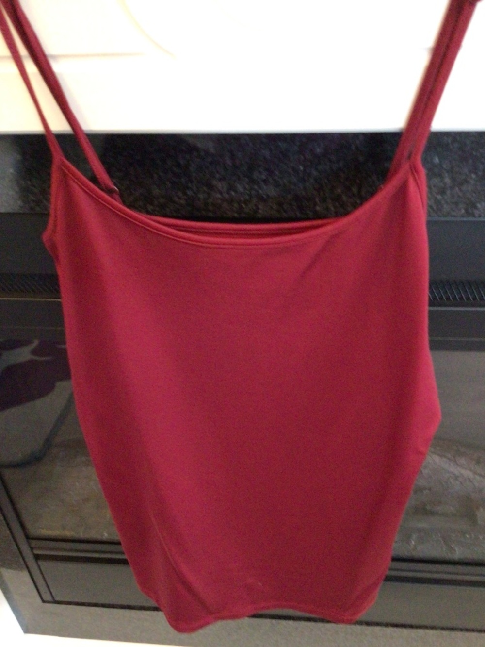 5/$25.00 Women’s pre-loved red cami with adjustable straps in good condition